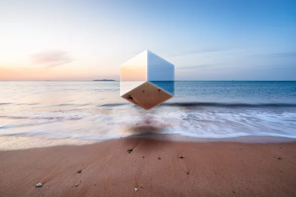 reflective cube on sand